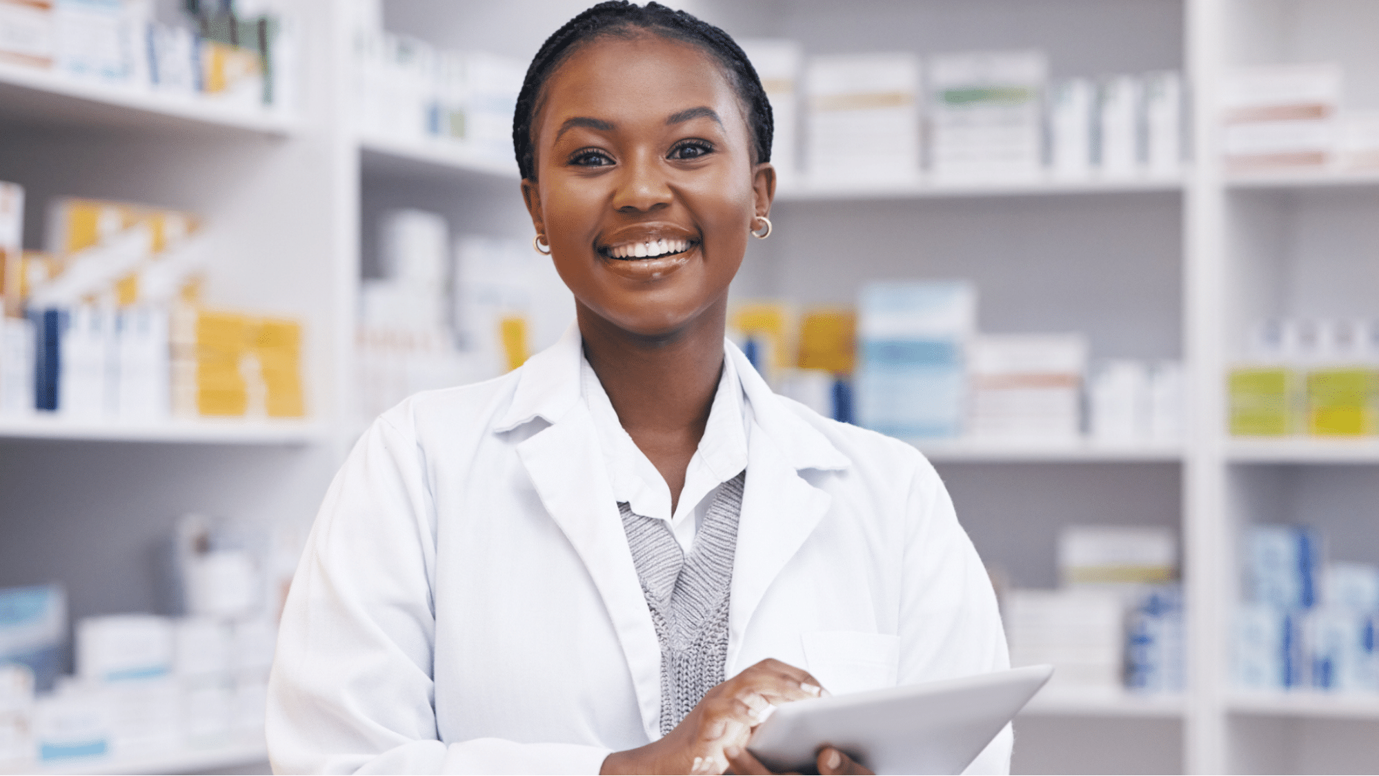 Phamracist smiling in pharmacy